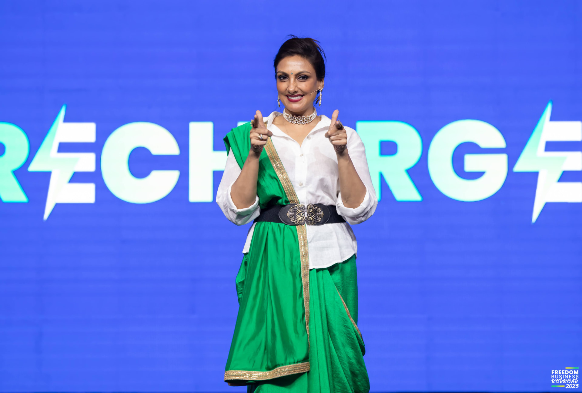 Pallavii Waalia Raaj speaking on stage